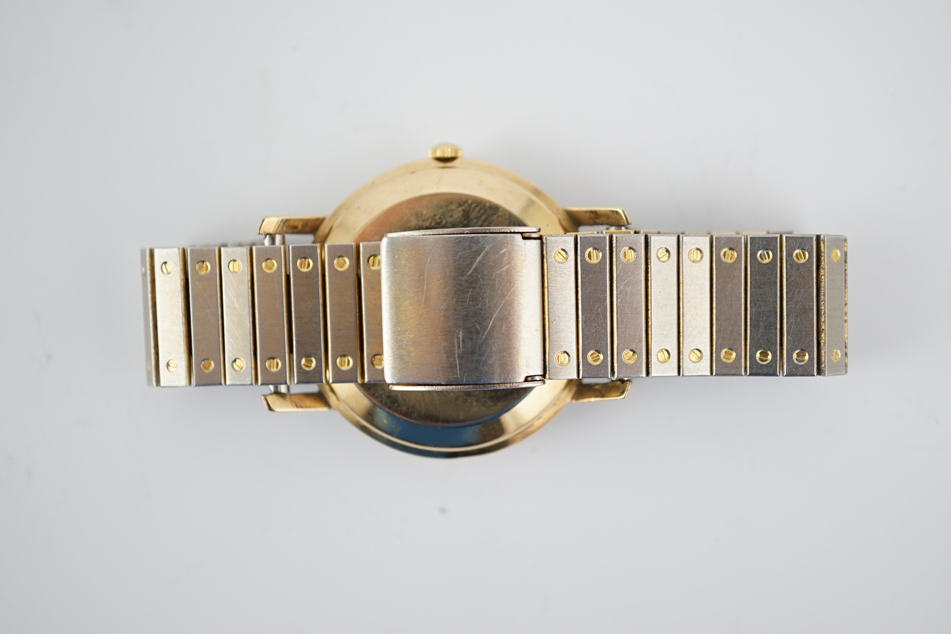 A gentleman’s 9ct gold Longines Flagship Automatic wrist watch, on associated metal bracelet, case diameter 35mm. Condition - poor to fair